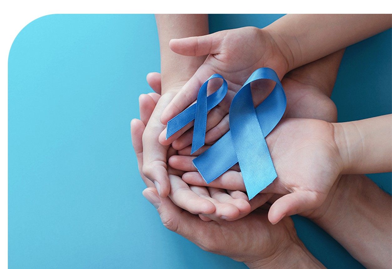 A group of hands holding two blue awareness ribbons